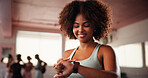Exercise, smart watch and woman in gym, wellness and check progress with workout. African person, fitness and athlete in health center, app for heart monitor and training with results or cardio stats