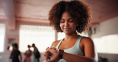 Buy stock photo Fitness, smart watch and woman in gym, check progress for exercise goals and cardio stats. African person, workout or athlete in health center, app for heart monitor or training with results or pride