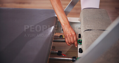 Buy stock photo Fitness, pilates and hands of person with machine in class for exercise, practice and training. Prepare, start and athlete in gym with reformer equipment set up for health, wellness and challenge