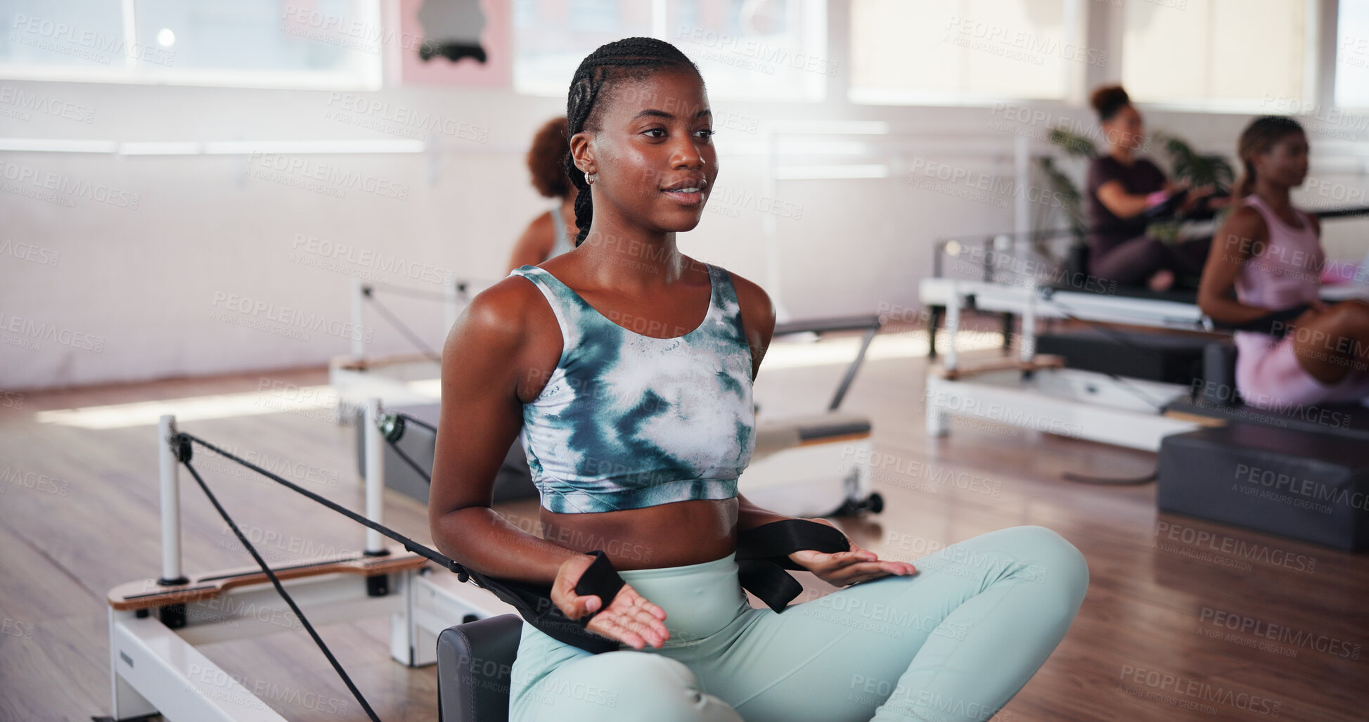 Buy stock photo Fitness, pilates and reformer with happy woman in class for improvement, training or workout routine. Equipment, exercise and smile with person on machine in studio for challenge or performance