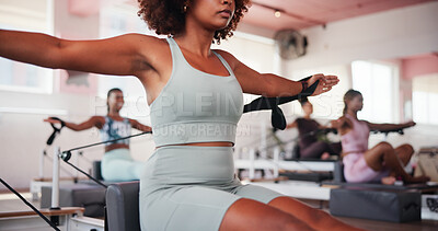 Buy stock photo Fitness, pilates and reformer with woman in gym for training or workout routine closeup. Concentration, equipment and exercise with body of person on machine in class for challenge or performance