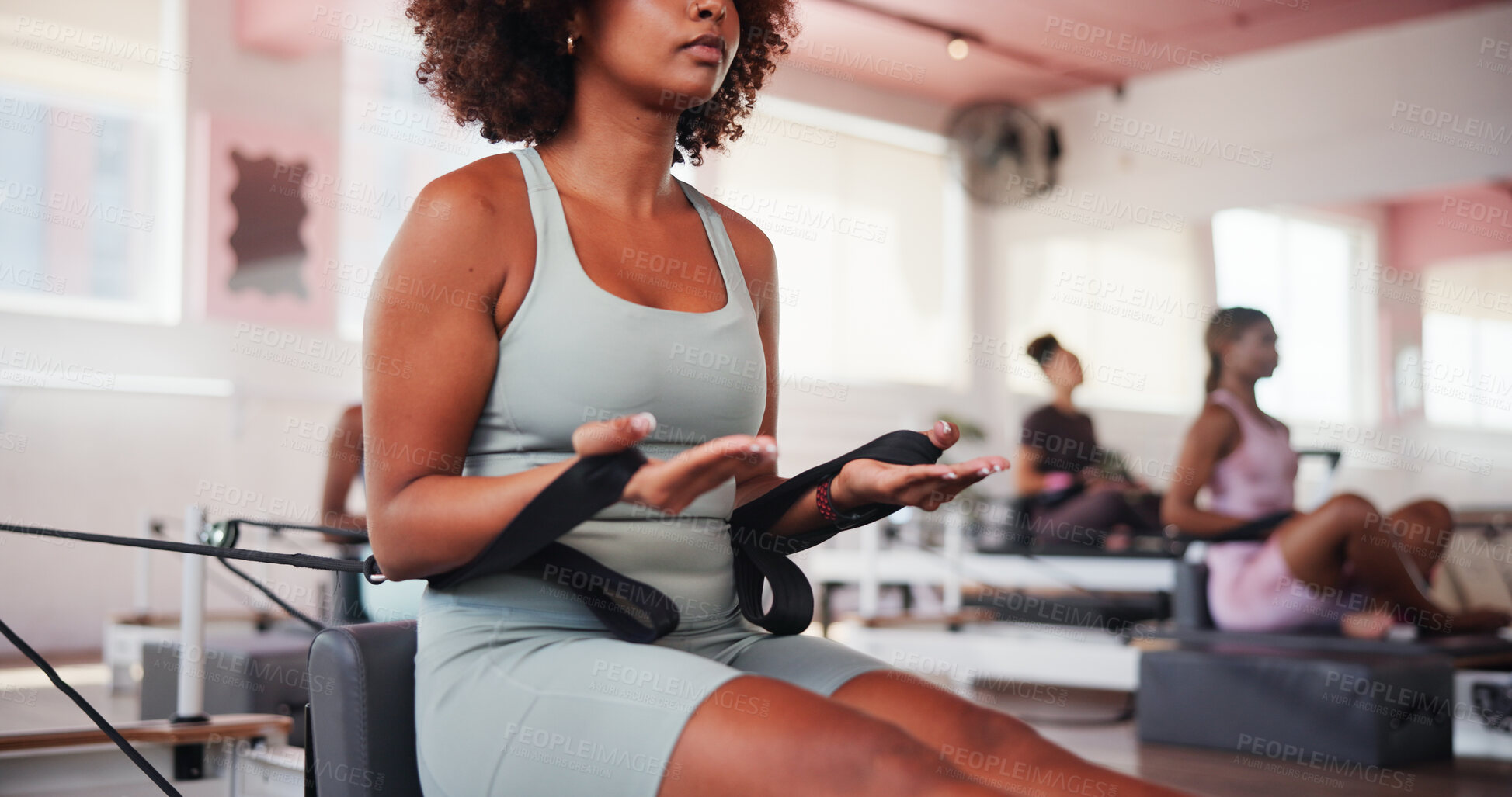 Buy stock photo Fitness, pilates and reformer with hands of woman in class for improvement, training or workout routine. Equipment, exercise and resistance with person on machine in gym for challenge or performance