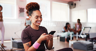 Buy stock photo Gym, woman and smile with phone for fitness, exercise video and funny reel on social media. Health club, female person and happiness with mobile for virtual tutorial, workout break and streaming app