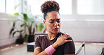 Gym, fitness and woman with shoulder pain for injury, muscle tension and inflammation in studio. Breathing, female person and wellness with hand massage for joint ache, discomfort or sore for workout