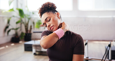 Buy stock photo Gym, fitness and woman with neck pain for injury, muscle tension and inflammation in studio. Health club, female person and wellness with massage for joint ache, discomfort and sore for workout