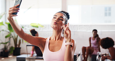 Buy stock photo Woman, selfie and peace sign at gym for fitness, pout and icon for post on web with social media. Influencer, girl and gesture with kiss, symbol or photography for profile picture at exercise club