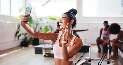 Buy stock photo Girl, selfie and peace sign at gym for fitness, happy and icon for post results on social media. Influencer, woman and gesture with smile, symbol or profile picture with healthy body exercise club