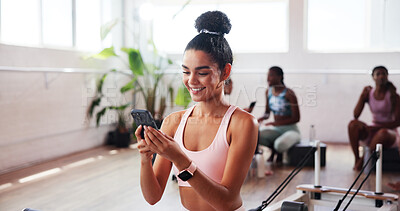 Buy stock photo Gym, happy woman and streaming with phone for fitness, health club or application for reel. Online, female person and smile with mobile for exercise video, social media or virtual tutorial for cardio