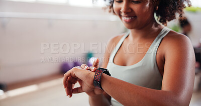 Buy stock photo Arm, pilates and time with woman in studio, tracking performance progress of training routine. Exercise, fitness and watch with hands of athlete in gym class for challenge, milestone or workout