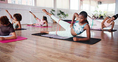 Buy stock photo Pilates, fitness and women with resistance band in class for training, workout and mobility. Exercise, gym and people with equipment for stretching for wellness, health and challenge for strength