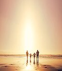 Sunset, family and holding hands at sea for holiday, walking and bonding together outdoor. Back, mother and father with children at ocean with mockup space, travel or summer adventure with parents