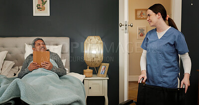 Buy stock photo Relax, senior man and nurse with wheelchair for help in bedroom with healthcare checkup. Tablet, medical consultation and caregiver by elderly patient with disability for transport in nursing home.