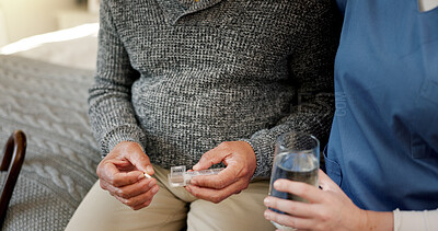 Buy stock photo Pills, hands and nurse with senior man in home for medication, supplements or vitamins for wellness. Health, water and caregiver with elderly patient for tablets with treatment in nursing facility.