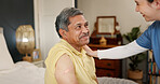 Nurse, mature man and discussion with bandage, injection and healthcare for retirement. Patient, caregiver and pensioner with nursing home, rehabilitation and bed for medical consulting and service