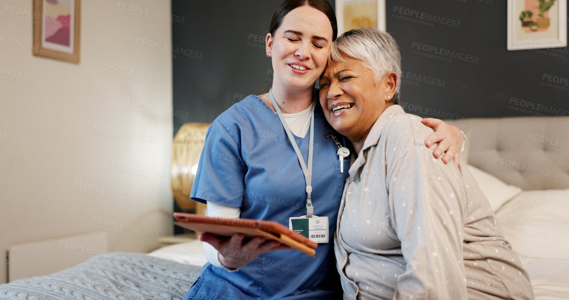 Buy stock photo Senior care, hug and caregiver with smile, nursing home and happy for diagnosis of illness and bonding. Bedroom, people and nurse with tablet for healthcare, embrace and empathy for elderly patient