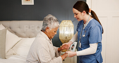 Buy stock photo Nurse, senior woman and holding hands for support, helping and healthcare for retirement. Patient, caregiver and pensioner with nursing home, rehabilitation and bed for medical consulting and service