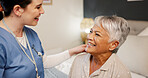 Nurse, mature woman and discussion with support, empathy and healthcare for retirement. Patient, caregiver and pensioner with nursing home, rehabilitation and bed for medical consulting and service