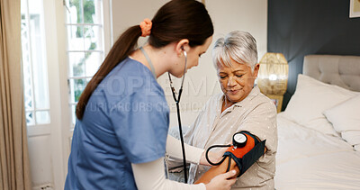 Buy stock photo Senior woman, nurse and blood pressure test in home, bedroom and trust with monitor for medical check. Elderly person, caregiver and smile for exam, support and healthcare services in retirement