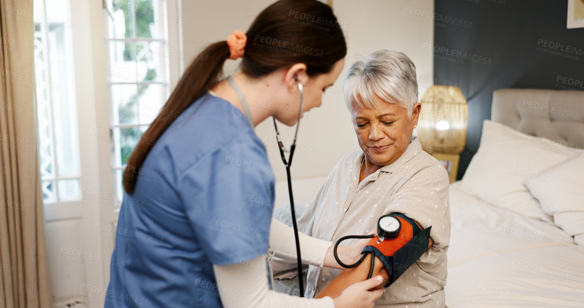 Buy stock photo Senior woman, nurse and blood pressure test in home, bedroom and trust with monitor for medical check. Elderly person, caregiver and smile for exam, support and healthcare services in retirement