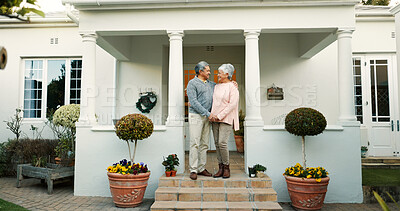 Buy stock photo Outdoor, love and senior couple with smile, home and happy elderly people with mortgage and bonding. Holding hands, old woman and man with marriage commitment, relationship and pride for real estate