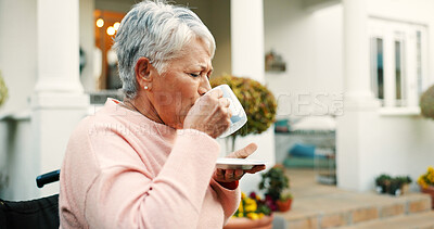 Buy stock photo Outdoor, coffee and senior woman in garden for morning relax, peace and calm in backyard of home. Retirement, wellness and elderly female person in wheelchair drinking cappuccino at nursing facility.