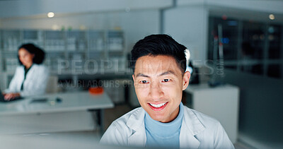 Buy stock photo Laboratory, scientist and man with computer for reading, medical research and happiness at night. Career, person and doctor with digital for pharmaceutical review, medicine report and results