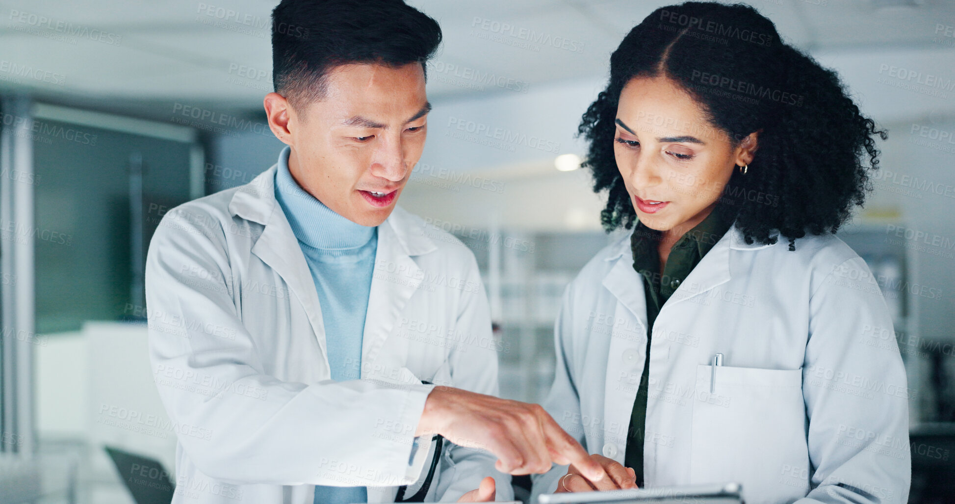 Buy stock photo Tablet, discussion and scientists in laboratory at night for medical research with pharmaceutical discovery. Meeting, digital technology and science team with online report for healthcare innovation.