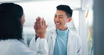 Buy stock photo Healthcare, doctors and smile with high five for teamwork, support and success for medical planning. Hospital, man and woman with hand gesture for moodboard goals, research solution and celebration