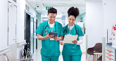Buy stock photo Doctors, man and woman with tablet, documents and report with smile for results, research and feedback. People, team and happy with digital touchscreen, app and review with medical info at hospital