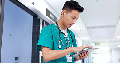 Buy stock photo Nurse, tablet and Asian man on internet for healthcare update, report and check records for telehealth. Technology, reading and serious medical worker with research, wellness and schedule in clinic