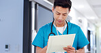 Healthcare, man and nurse with document for writing, patient information and medical records. Hospital, asian person and surgeon with paperwork for diagnosis notes, review and report for treatment