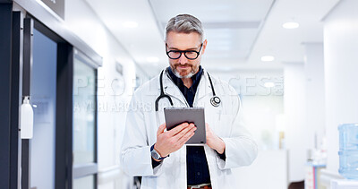 Buy stock photo Healthcare, man and doctor with tablet for reading, patient information and medical research. Hospital, mature person and surgeon with digital for diagnosis results, review and report for treatment