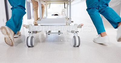 Buy stock photo Gurney, healthcare and legs of doctors in hospital for emergency, operation or surgery. Medical, running and rush with team of urgent medicine professionals in hallway to save patient or victim