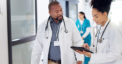 Buy stock photo Healthcare, doctors and tablet in hospital for advice, diagnosis feedback and patient chart for opinion. People, cardiology specialists and tech in clinic for information and brainstorming treatment