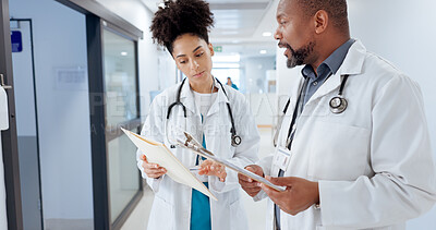 Buy stock photo Healthcare, doctors and folder in hospital for advice, diagnosis feedback and patient chart for opinion. People, cardiology specialists and paper in clinic for information and brainstorming treatment