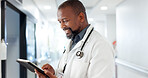 Hospital, doctor and black man on tablet for online consulting, medical service and diagnosis. Healthcare, clinic and person in hallway on digital tech for planning schedule, appointment or insurance