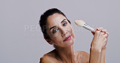 Buy stock photo Beauty, brush or portrait of mature woman in studio for glow, results or transformation on grey background. Facial, mockup space or confident model with skincare cosmetics, foundation or makeup tools
