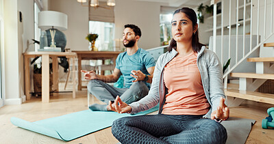 Buy stock photo Fitness, inner peace and meditation with couple in living room of home for bonding, health or wellness together. Balance, exercise or yoga with man and woman in apartment for holistic awareness
