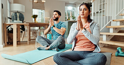Buy stock photo Exercise, meditation and yoga with couple in living room of home for bonding, health or wellness together. Fitness, holistic or inner peace with man and woman in apartment for balance or relax