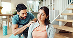 Fitness, massage and shoulder pain with couple in living room of home for bonding, health or wellness together. Exercise, injury or yoga with man and woman in apartment for recovery or rehabilitation