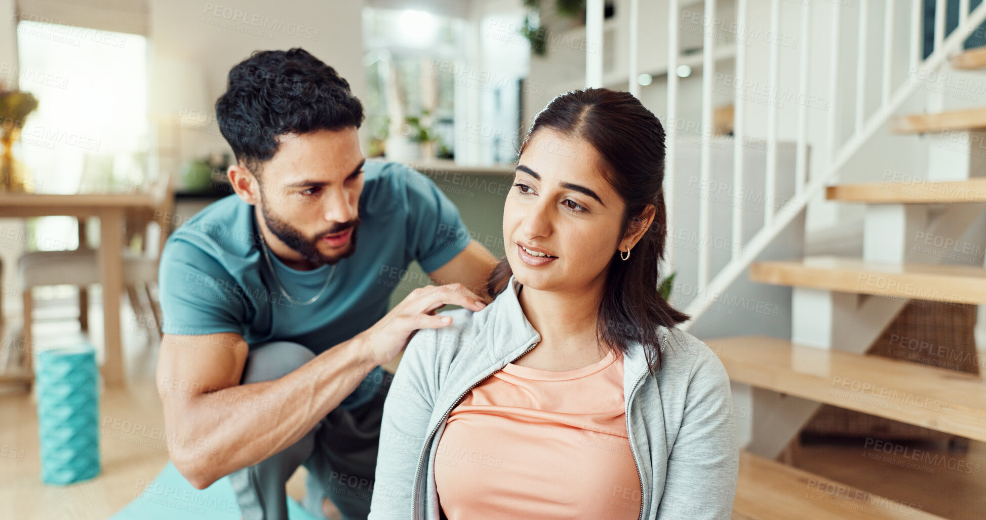 Buy stock photo Fitness, massage and shoulder pain with couple in living room of home for bonding, health or wellness together. Exercise, injury or yoga with man and woman in apartment for recovery or rehabilitation