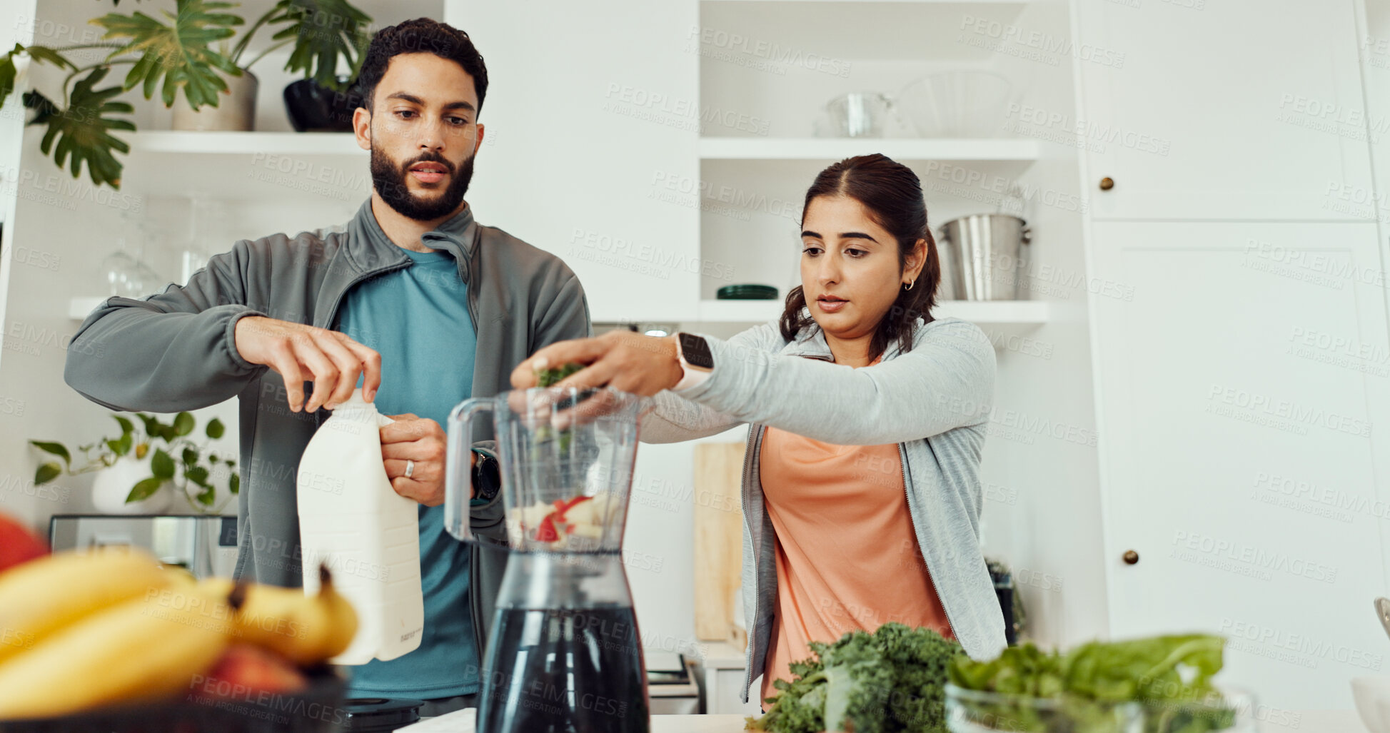 Buy stock photo Fruits, blender and couple in kitchen, smooth and balance with health benefits, wellness and bonding together. Home, vegetables and man with woman, nutrition and detox recipe with breakfast and diet