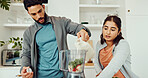 Milk, ingredients and couple with smoothie in home for wellness, nutrition or diet breakfast. Groceries, bonding and man helping woman with blender for juice detox in kitchen at apartment together.