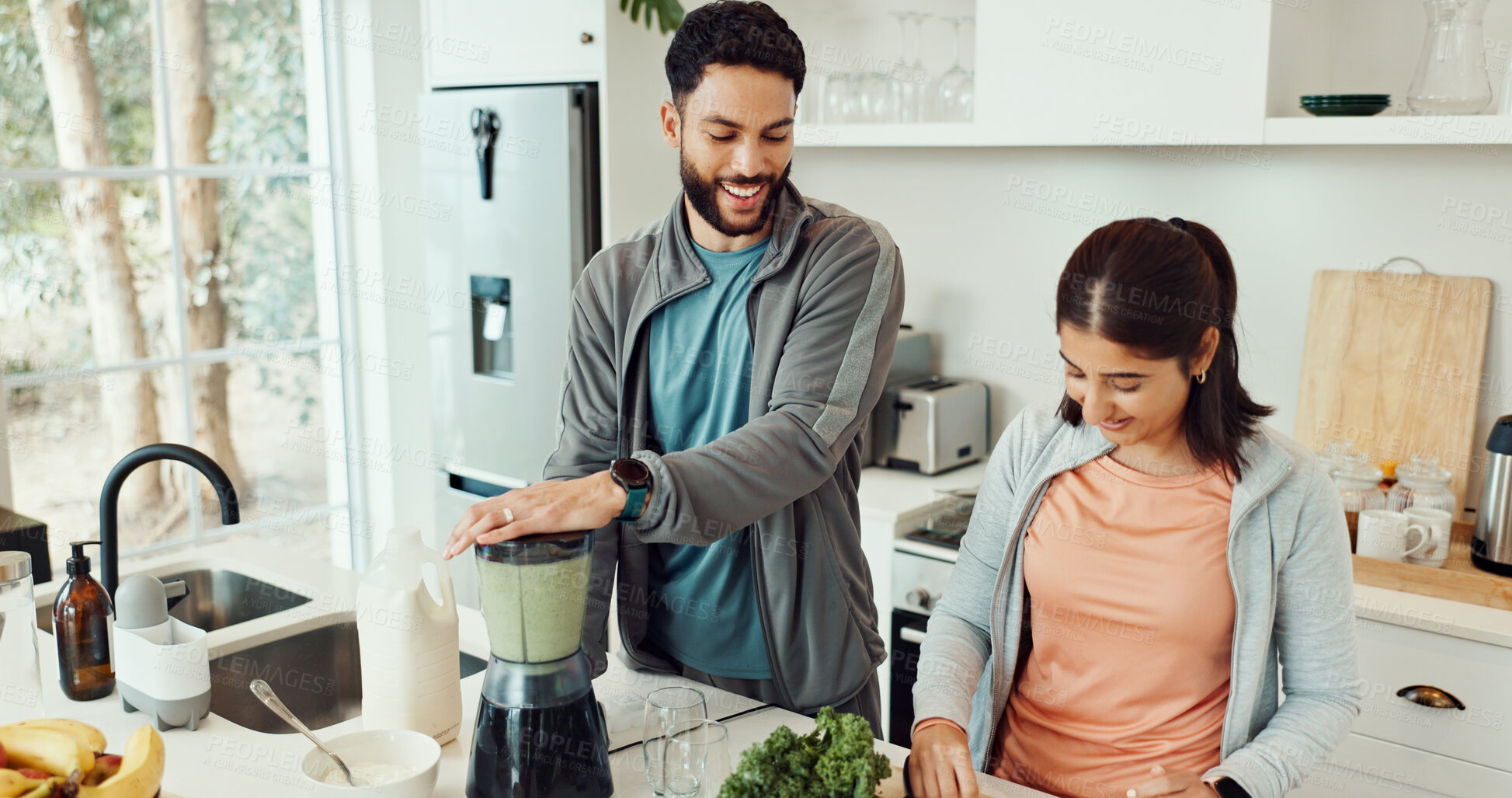 Buy stock photo Home, blender and couple in kitchen, smooth and balance with health benefits, smile and bonding together. Apartment, people and man with woman, nutrition and wellness with fitness, breakfast and diet