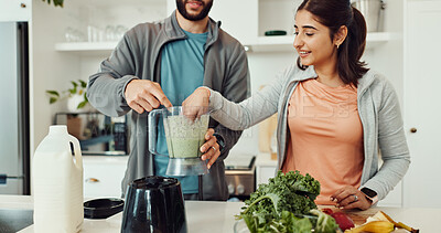 Buy stock photo Wellness, ingredients and couple with smoothie in home for health, nutrition or diet breakfast. Groceries, bonding and man helping woman with blender for juice detox in kitchen at apartment together.