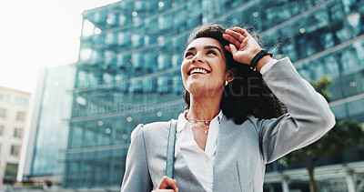 Buy stock photo Business woman, thinking and happy in city with commute to job, direction and outdoor to start career. Person, street and smile with low angle, reflection and perspective with inspiration in Colombia