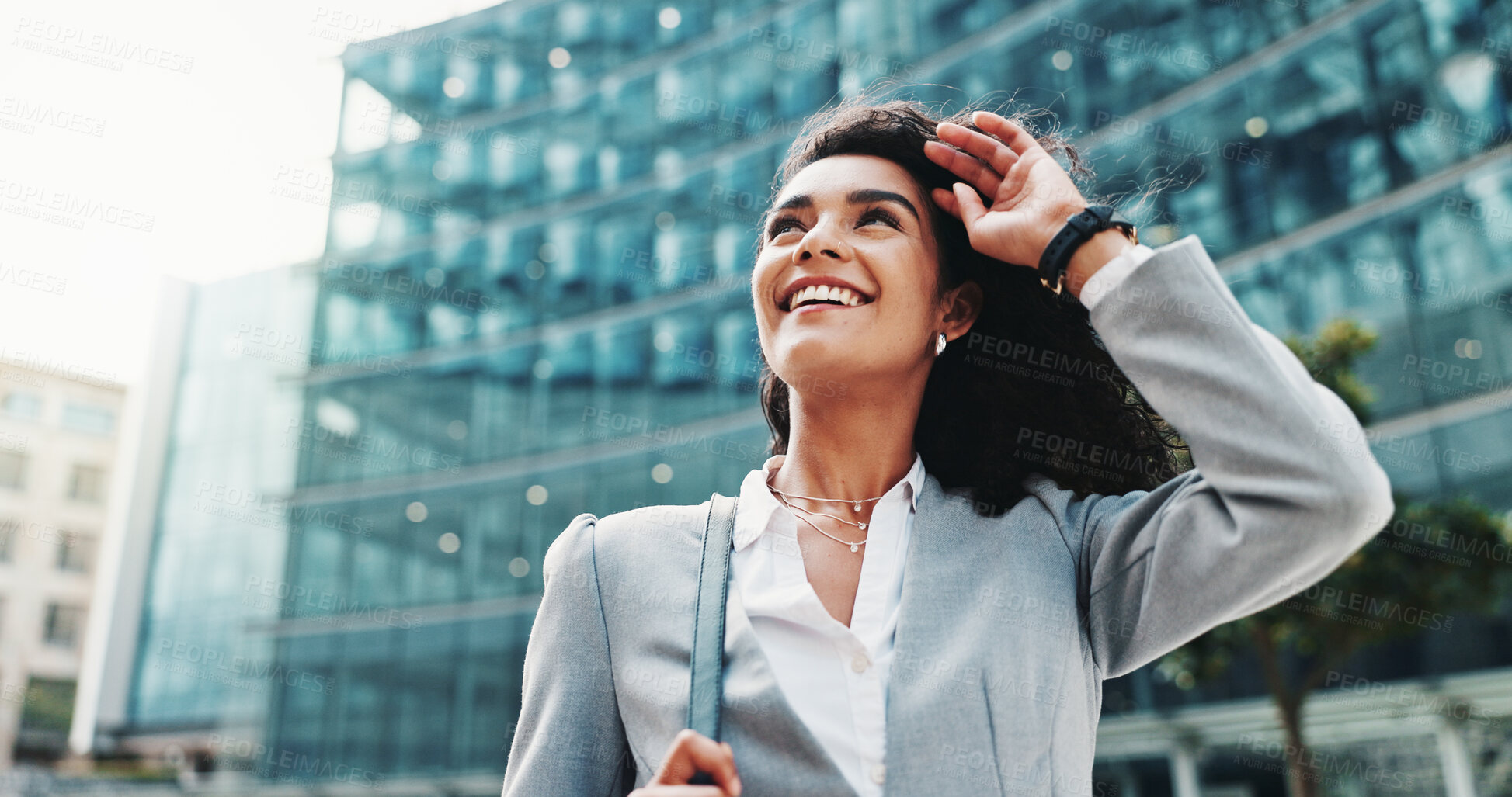 Buy stock photo Business woman, thinking and happy in city with commute to job, direction and outdoor to start career. Person, street and smile with low angle, reflection and perspective with inspiration in Colombia