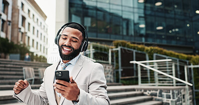 Buy stock photo Business, headphones and man with cellphone, dance and digital app with audio, listening to music and energy. Happy person, employee and consultant in street, smartphone or headset for song streaming