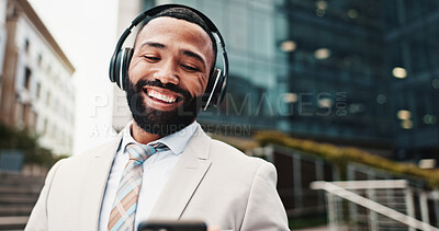 Buy stock photo Business, headphones and man with cellphone, smile and digital app with audio, listening to music and radio. Happy person, employee and consultant in street, celebration and headset with sound