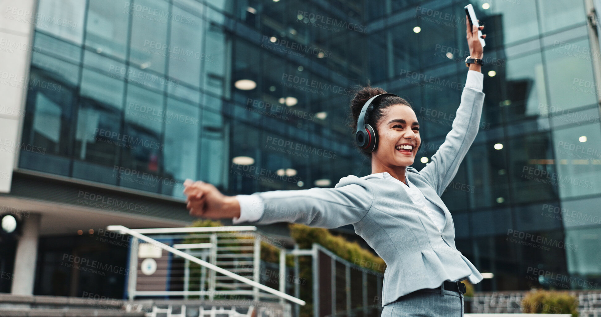 Buy stock photo Business, headset and woman in city, dancing and smile with audio, listening to music and podcast. Happy person, energy and consultant in street, cellphone and headphones with celebration and success